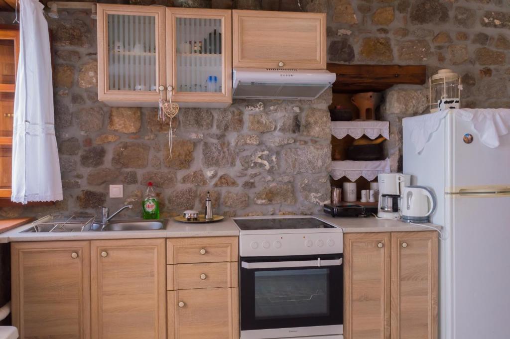 Kuchyň nebo kuchyňský kout v ubytování Manos House in Chora
