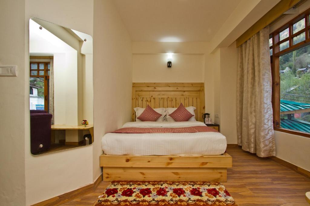 Letto o letti in una camera di Hotel Hayer Regency