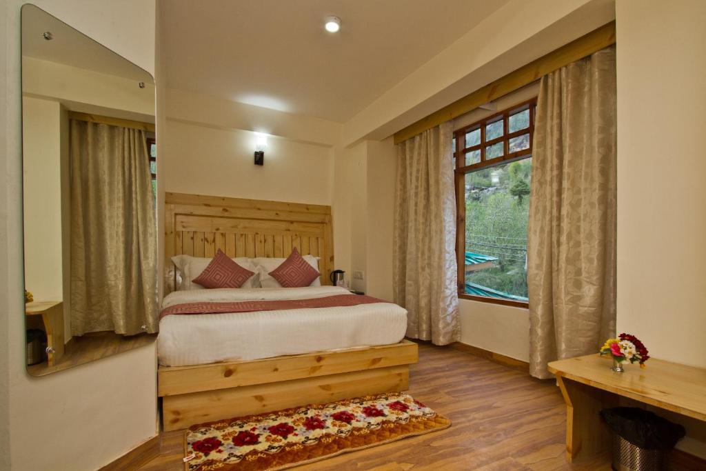 Letto o letti in una camera di Hotel Hayer Regency