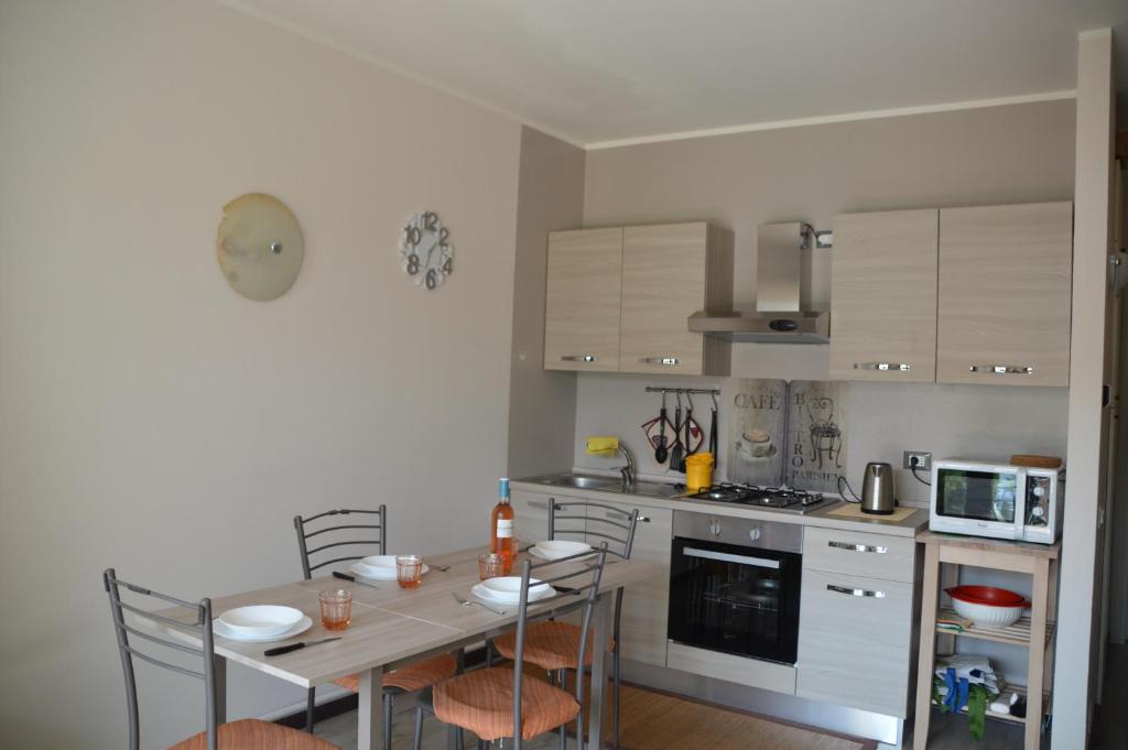 Kuchyň nebo kuchyňský kout v ubytování Cinzia's Home
