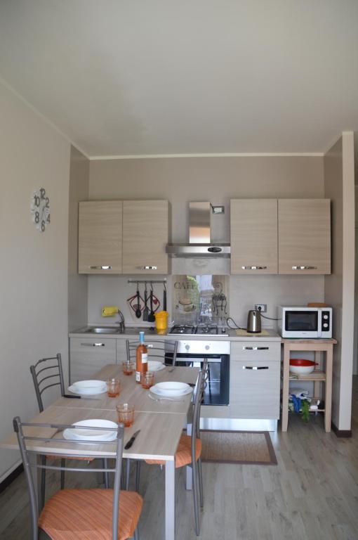 Kuchyň nebo kuchyňský kout v ubytování Cinzia's Home