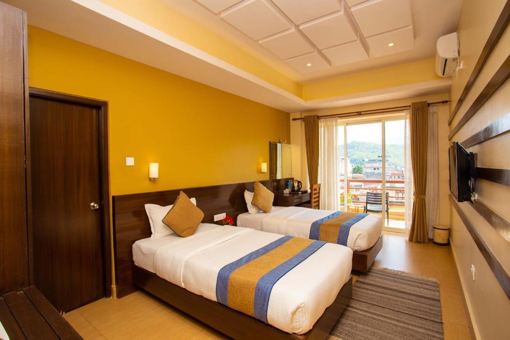 Katil atau katil-katil dalam bilik di Hotel Lake Paradise