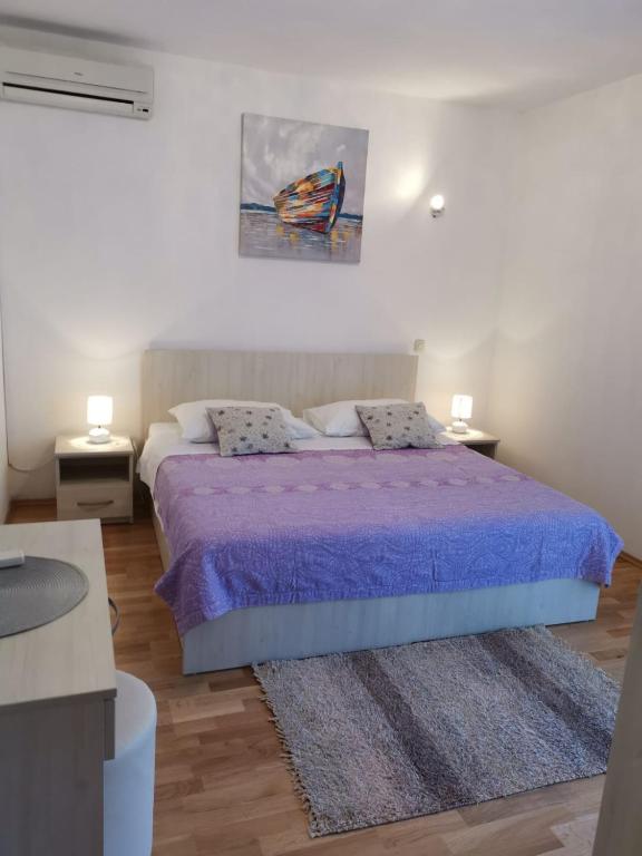 Posteľ alebo postele v izbe v ubytovaní Apartments Nikola Stipišić