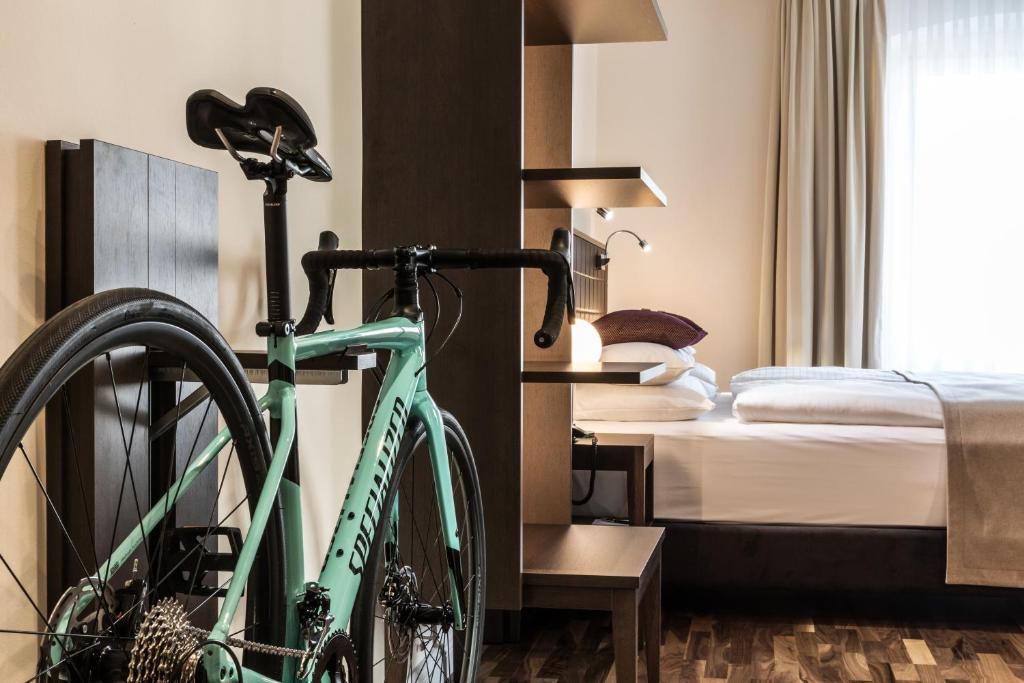 Krevet ili kreveti u jedinici u okviru objekta Hotel Sandwirth