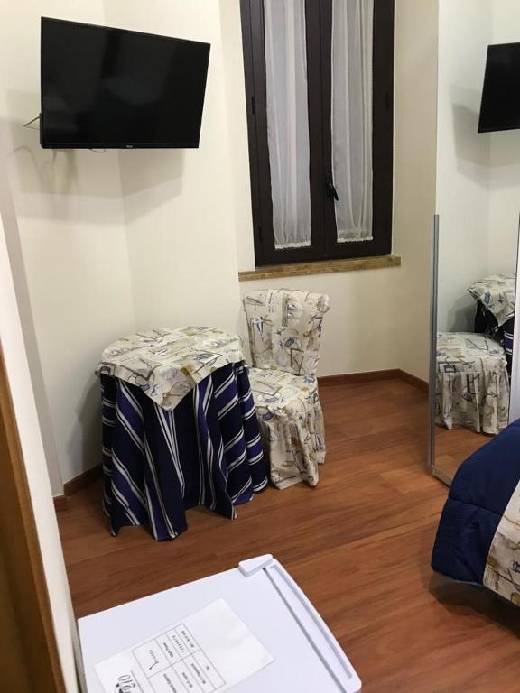 Telewizja i/lub zestaw kina domowego w obiekcie B&B Foria 210