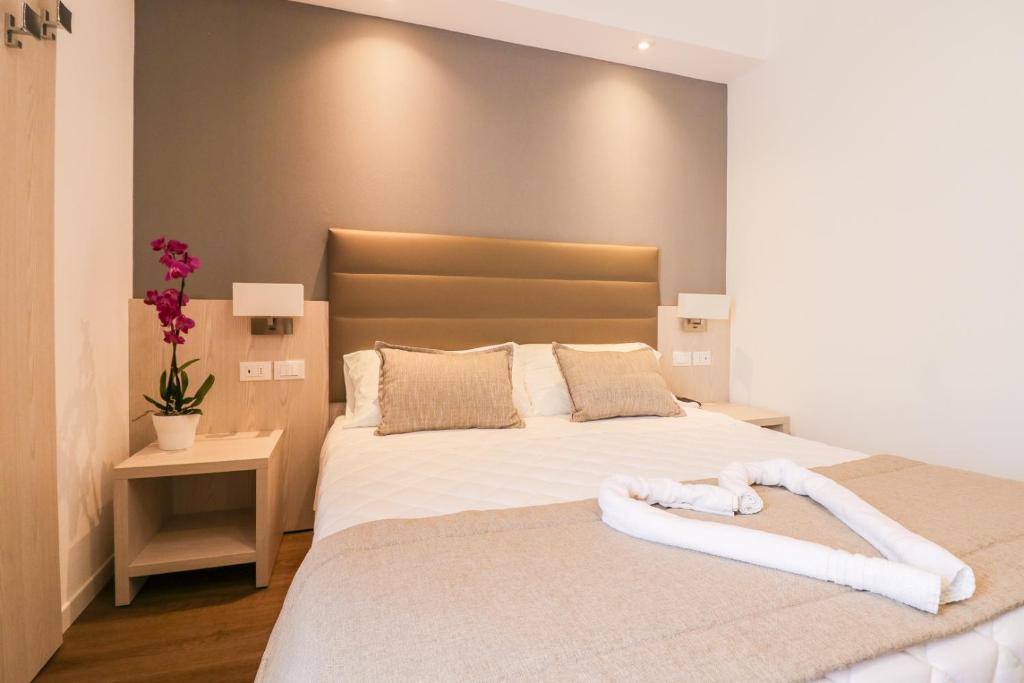 Postel nebo postele na pokoji v ubytování Hotel Loreley