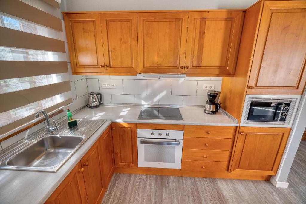 Kuchyň nebo kuchyňský kout v ubytování Ona Las Brisas