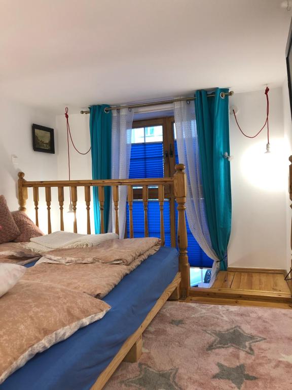 Posteľ alebo postele v izbe v ubytovaní Old Town żuraw gdański