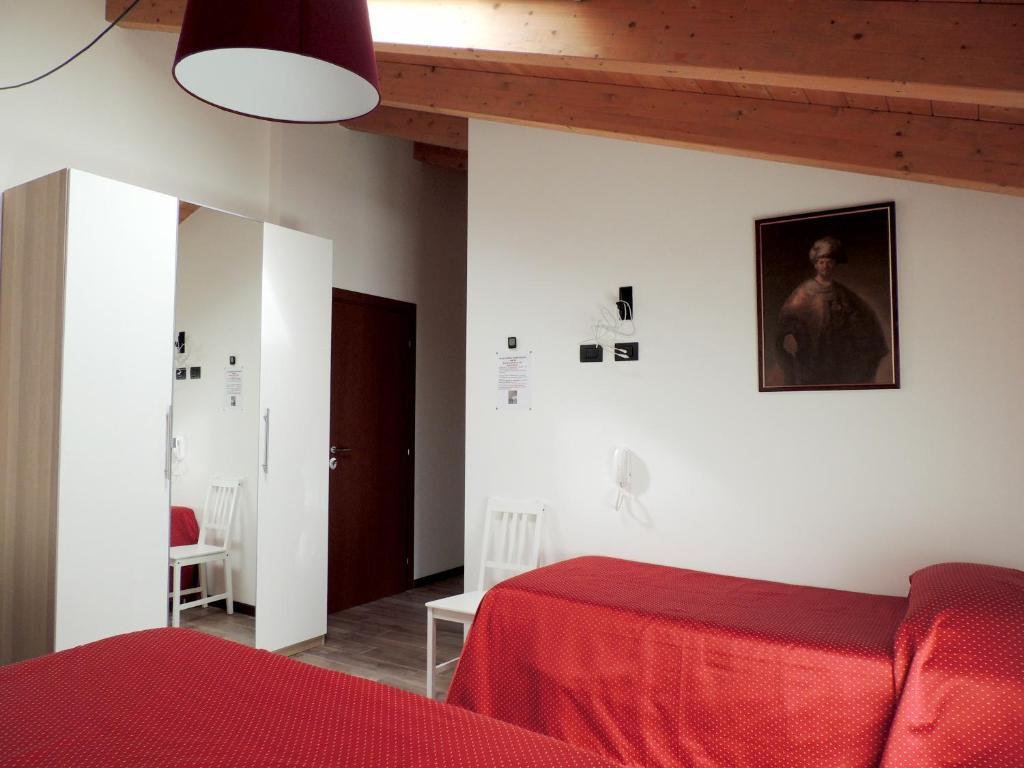 Posteľ alebo postele v izbe v ubytovaní foresteria re artù