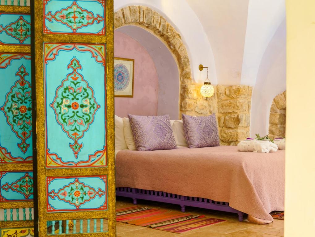 Postel nebo postele na pokoji v ubytování The Way Inn - Boutique Suites