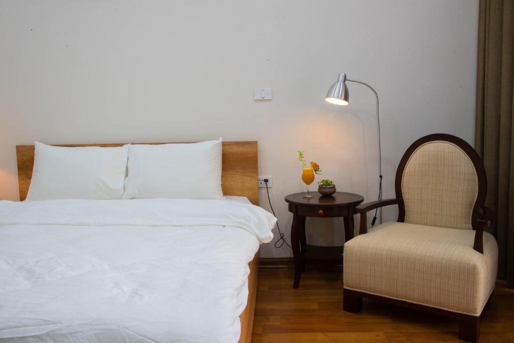 Postel nebo postele na pokoji v ubytování Picturesque Hanoi Homestay