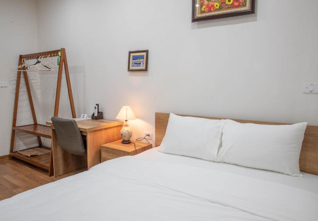 Postel nebo postele na pokoji v ubytování Picturesque Hanoi Homestay