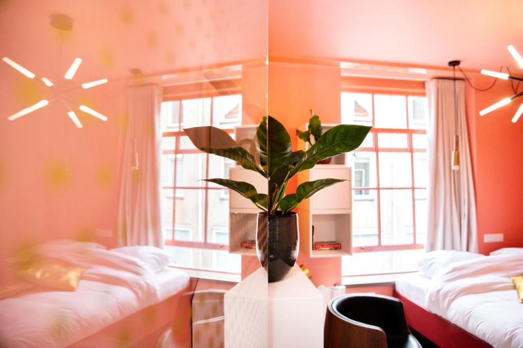 Postel nebo postele na pokoji v ubytování Hotel Bruno