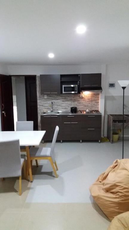 A cozinha ou cozinha compacta de Apartamento el eden