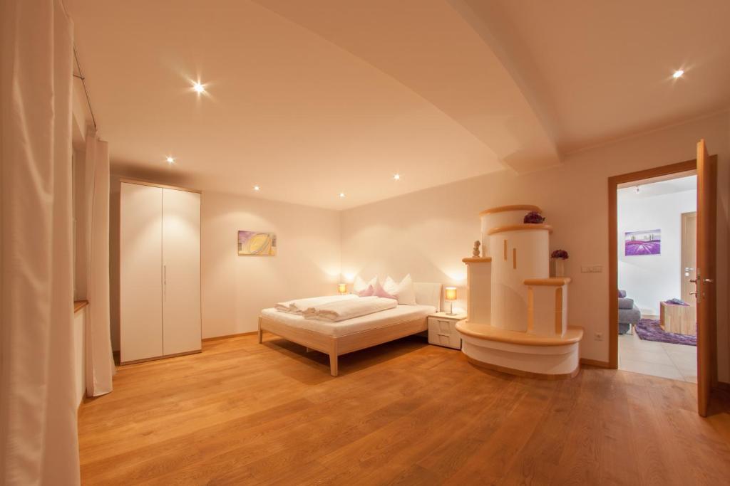 Posteľ alebo postele v izbe v ubytovaní Appartements Verdinserhöhe