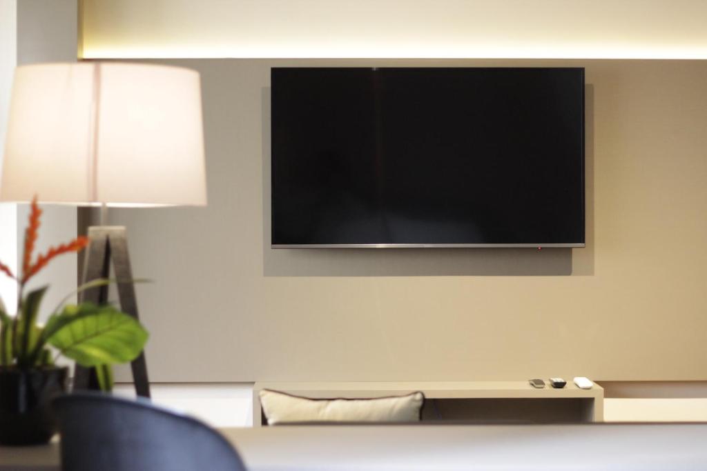 TV a/nebo společenská místnost v ubytování Central Park Flat Jardins