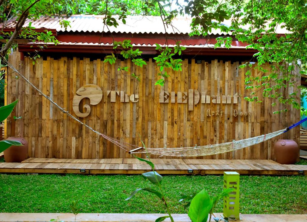 a hammock attached to a wooden fence at The Elephant Next-Door in Udawalawe