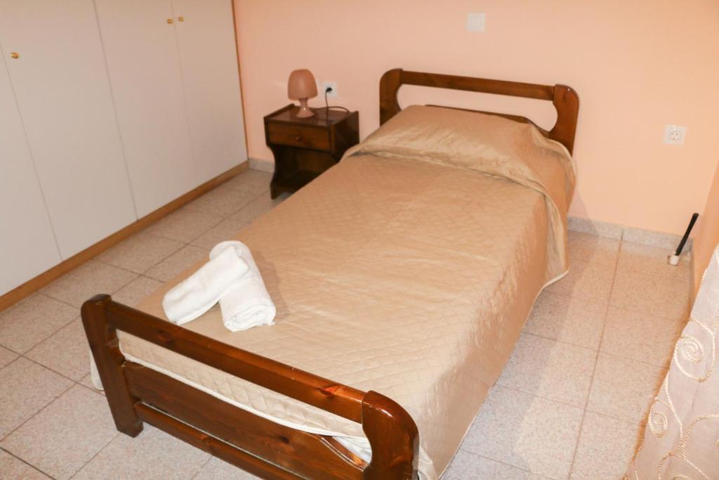 A bed or beds in a room at Nikolas view house