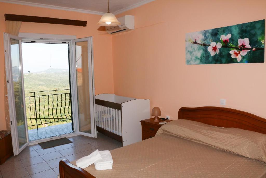 A bed or beds in a room at Nikolas view house