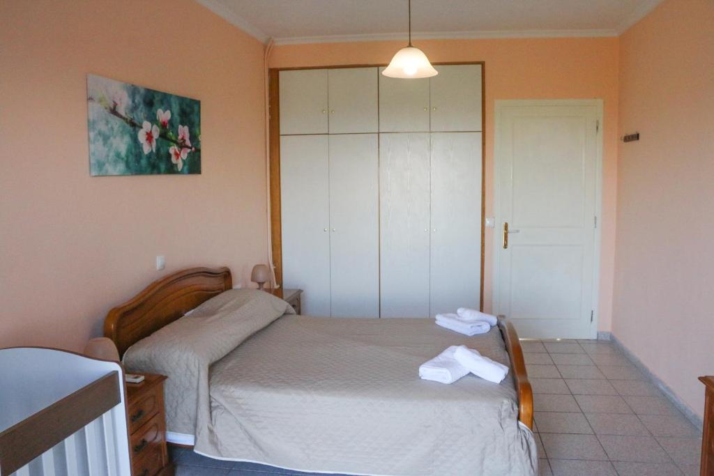 A bed or beds in a room at Nikolas view house