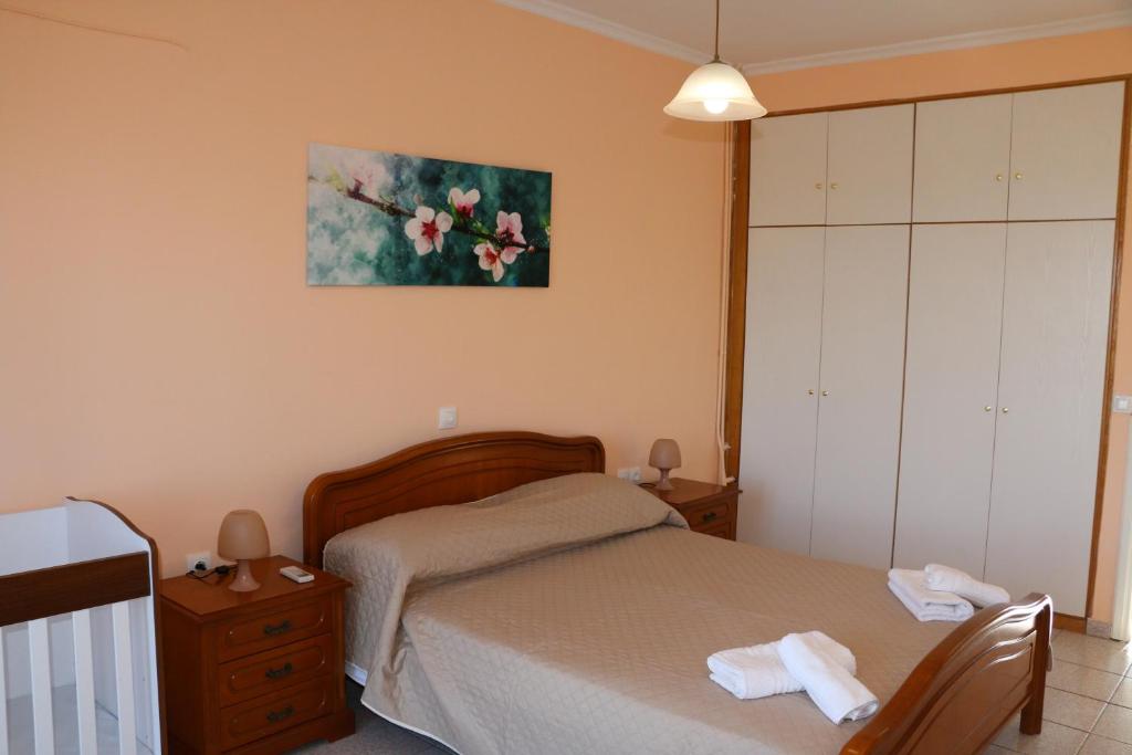 A bed or beds in a room at Nikolas view house