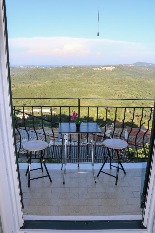 A balcony or terrace at Nikolas view house