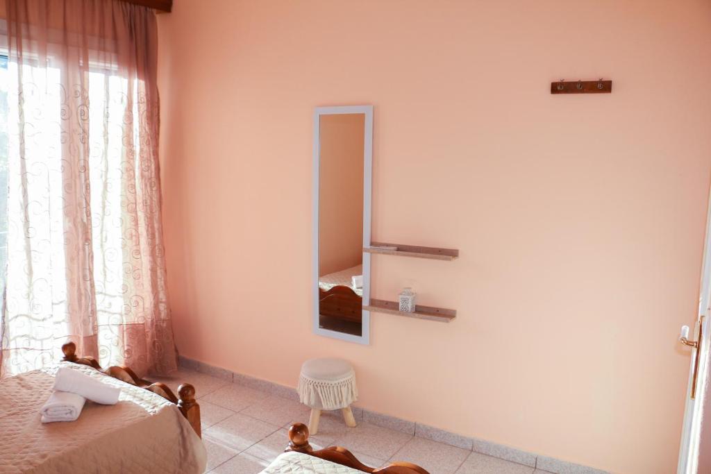 A bed or beds in a room at Nikolas view house