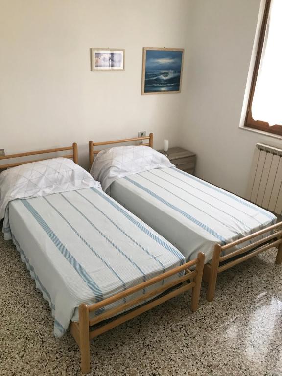 Postel nebo postele na pokoji v ubytování Casetta Rosada