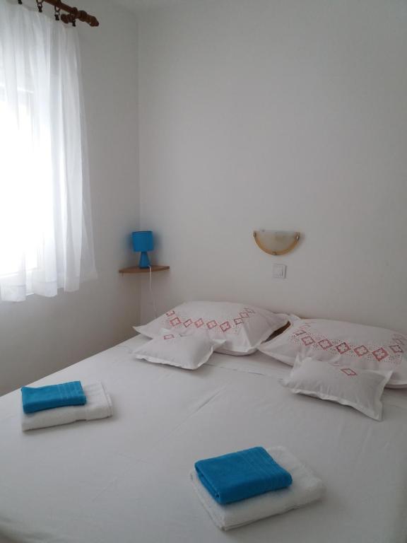 Postel nebo postele na pokoji v ubytování Apartment Fortuna