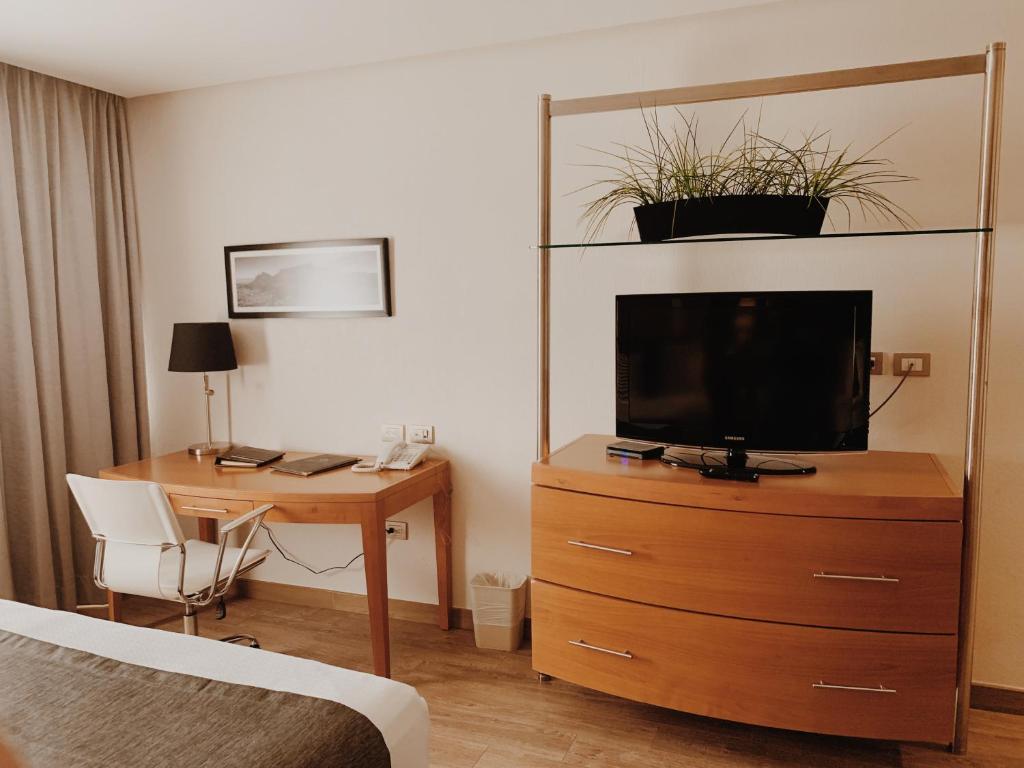 TV a/nebo společenská místnost v ubytování Hotel Mercury Inn