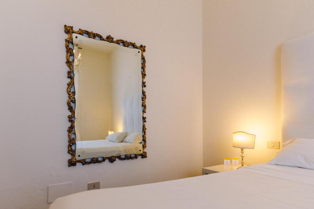 Postel nebo postele na pokoji v ubytování Exclusive Aparthotel La Reunion