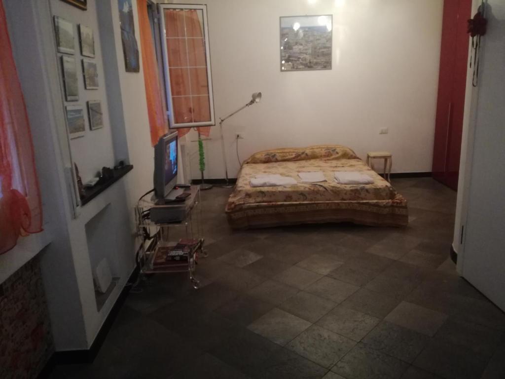 Un pat sau paturi într-o cameră la San Matteo Studio