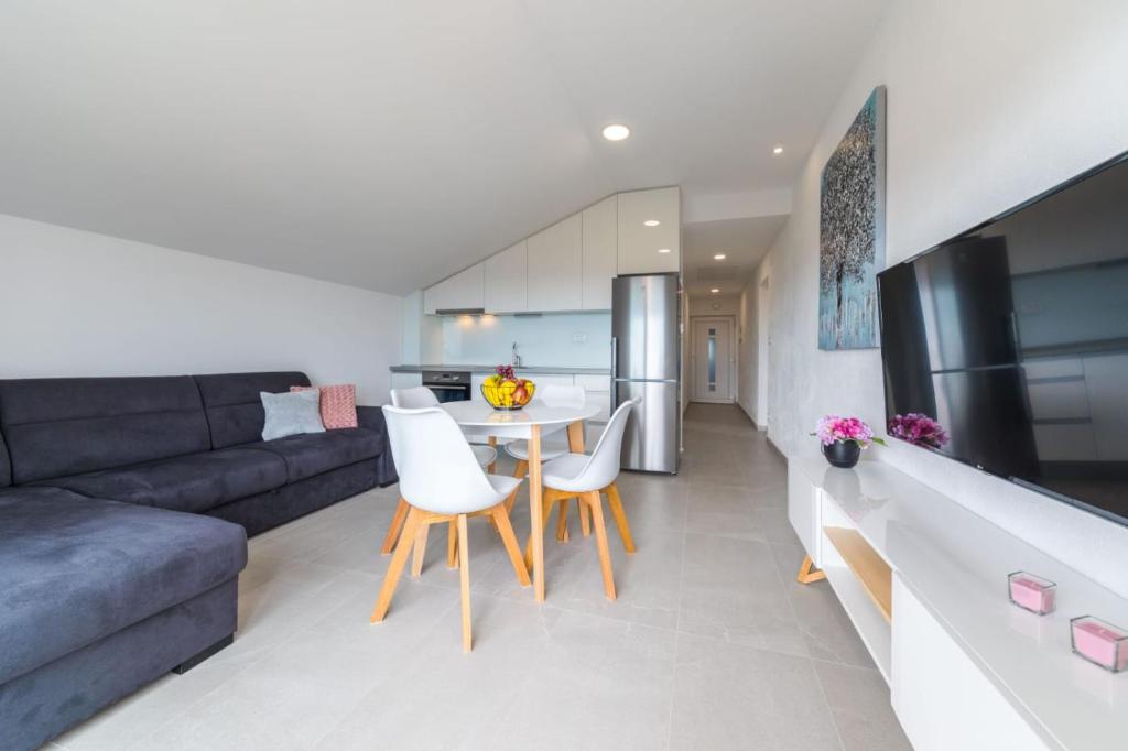 TV a/nebo společenská místnost v ubytování Sun Apartment Klis