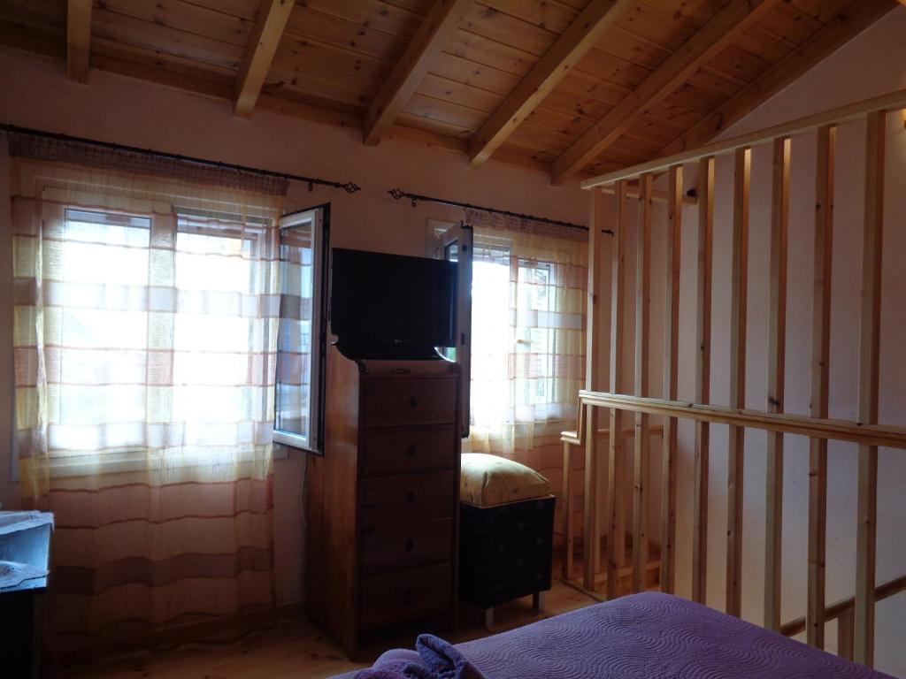 TV a/nebo společenská místnost v ubytování Harry's Retreat