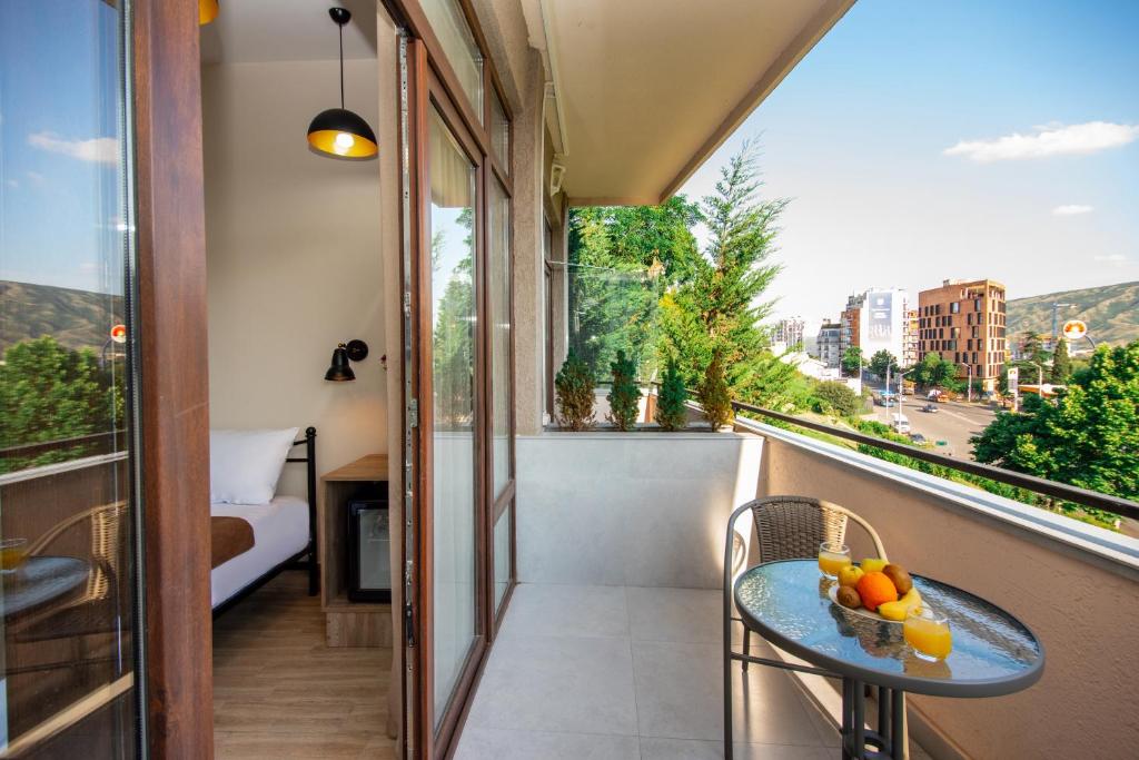 Balkón nebo terasa v ubytování Tonusi Luxe Hotel in the Historic City Center
