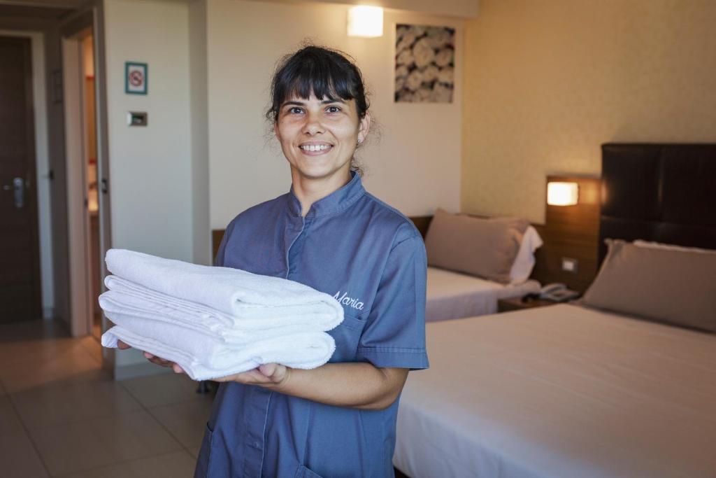 Členové personálu v ubytování Aqua Hotel