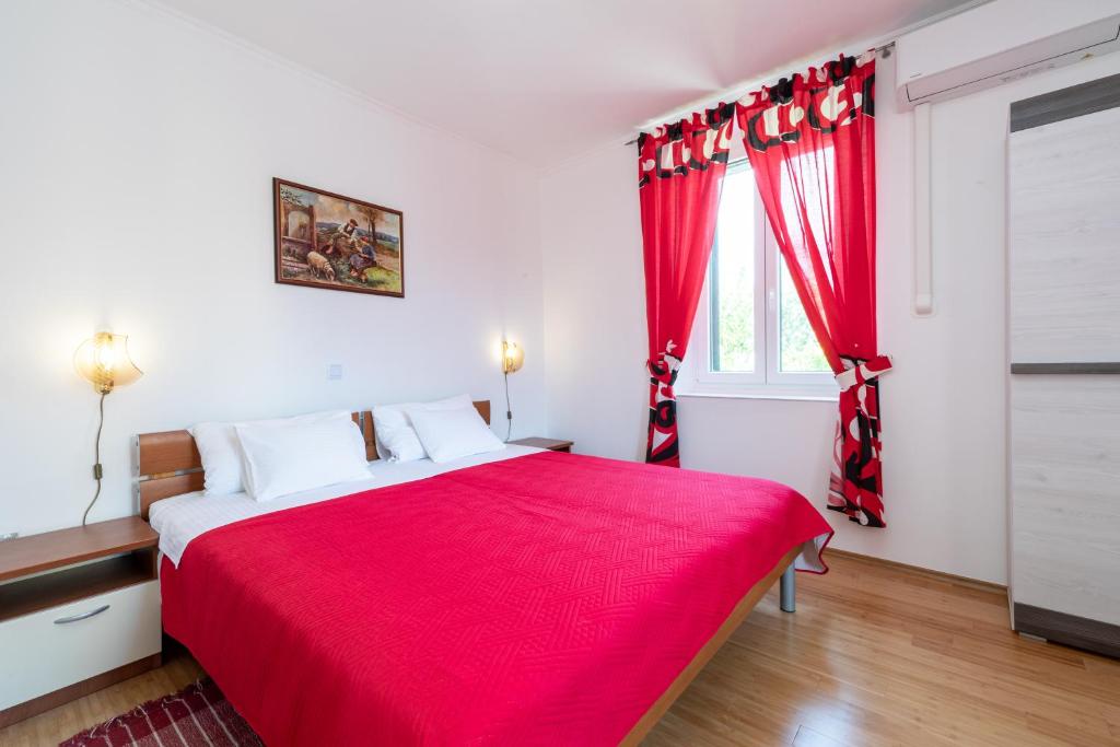 Postel nebo postele na pokoji v ubytování Marica Guesthouse