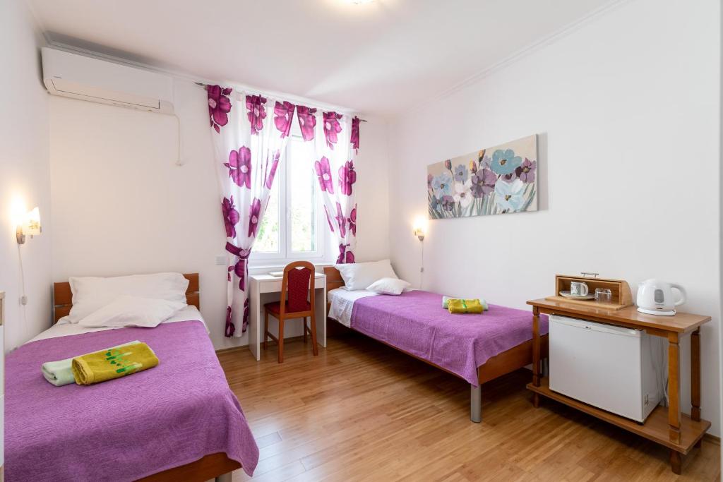 Postel nebo postele na pokoji v ubytování Marica Guesthouse