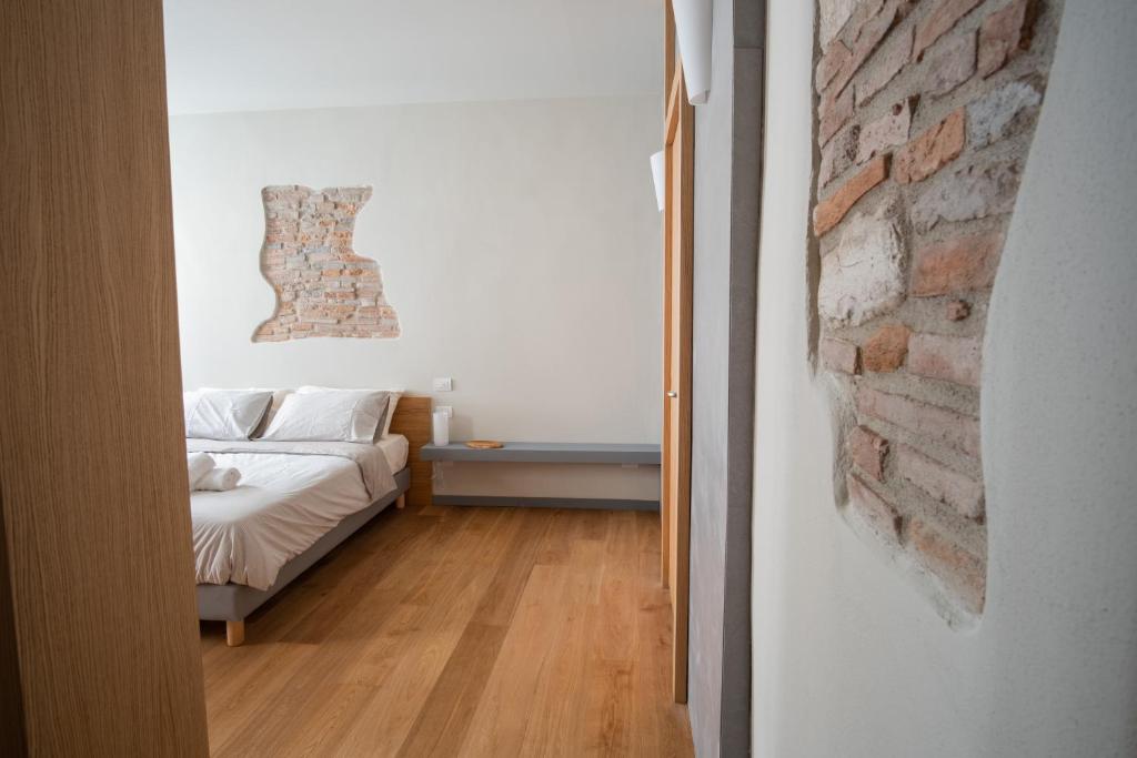 Postel nebo postele na pokoji v ubytování Chill in Tuscany