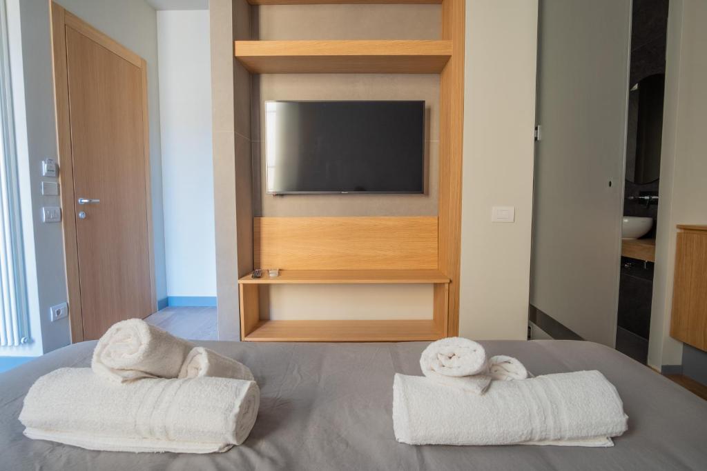Postel nebo postele na pokoji v ubytování Chill in Tuscany