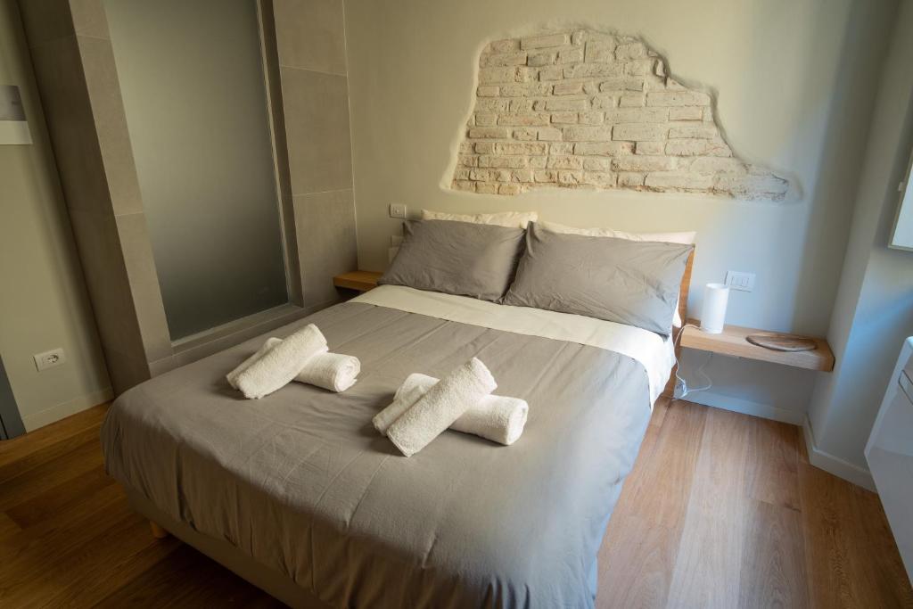 Postel nebo postele na pokoji v ubytování Chill in Tuscany