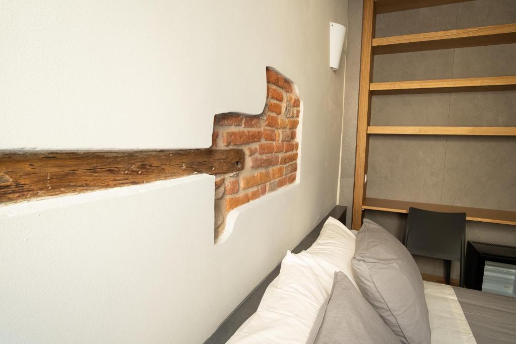 Postel nebo postele na pokoji v ubytování Chill in Tuscany