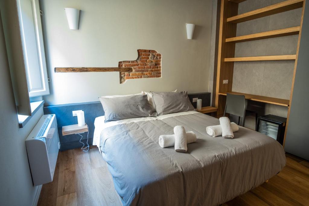 Postel nebo postele na pokoji v ubytování Chill in Tuscany