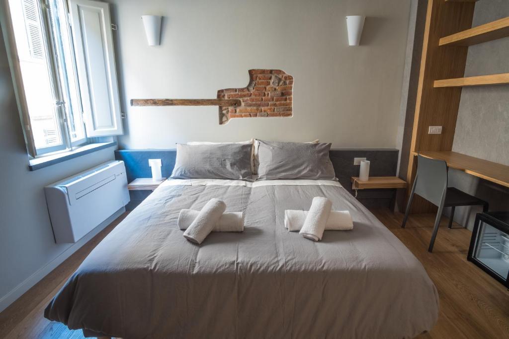 Postel nebo postele na pokoji v ubytování Chill in Tuscany