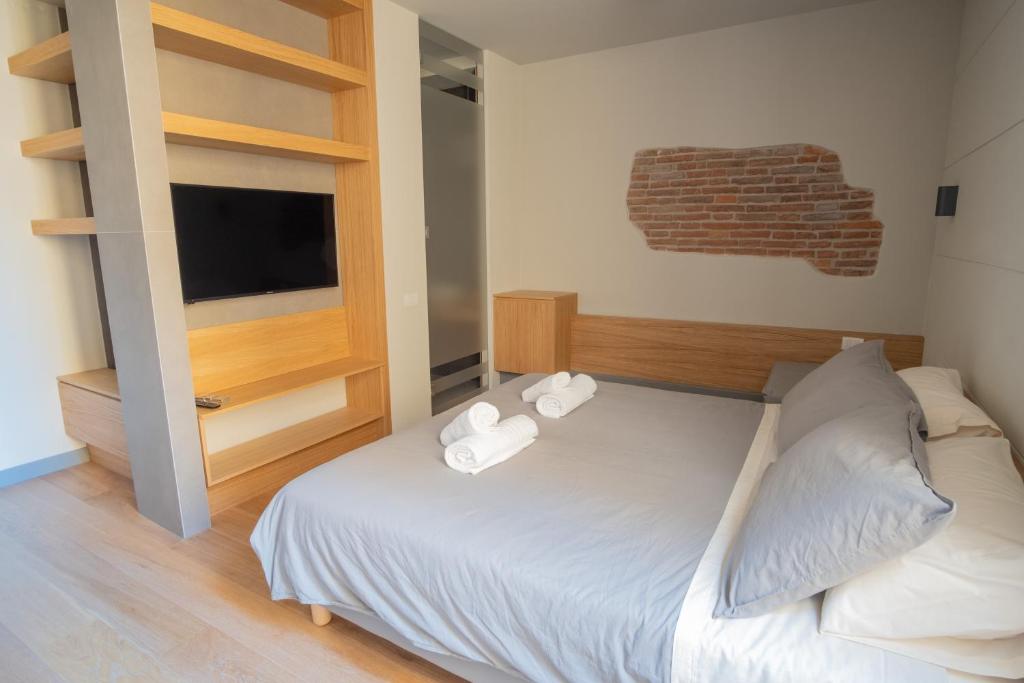 Postel nebo postele na pokoji v ubytování Chill in Tuscany