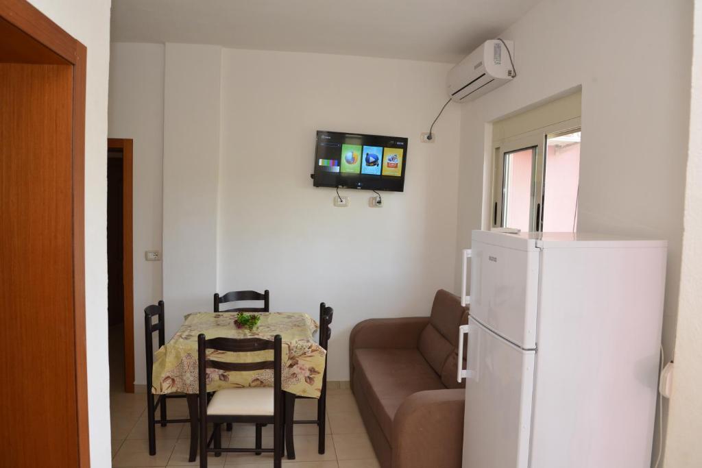 TV a/nebo společenská místnost v ubytování Hotel Gonaj