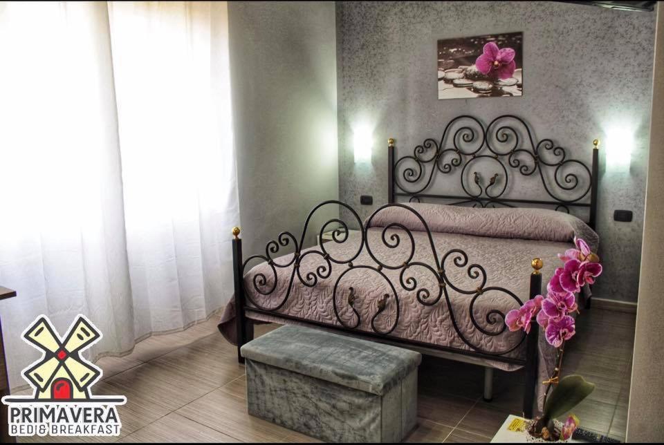 Ένα ή περισσότερα κρεβάτια σε δωμάτιο στο Bed&Breakfast La Primavera
