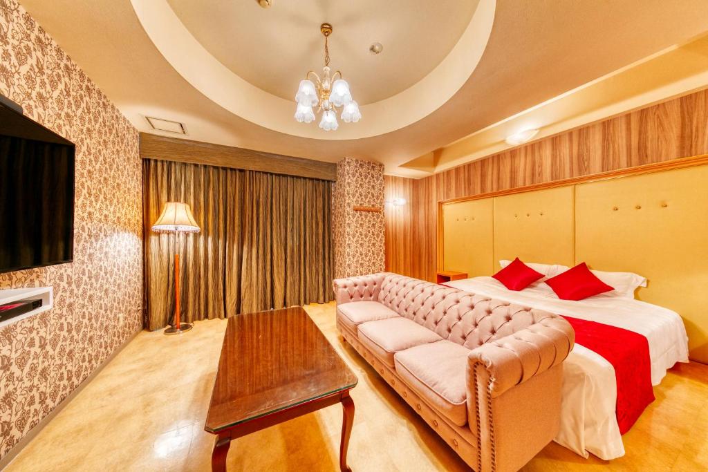Postel nebo postele na pokoji v ubytování Hotel Luna Otsu (Adult Only)