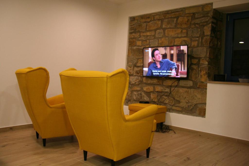 TV a/nebo společenská místnost v ubytování Olivia