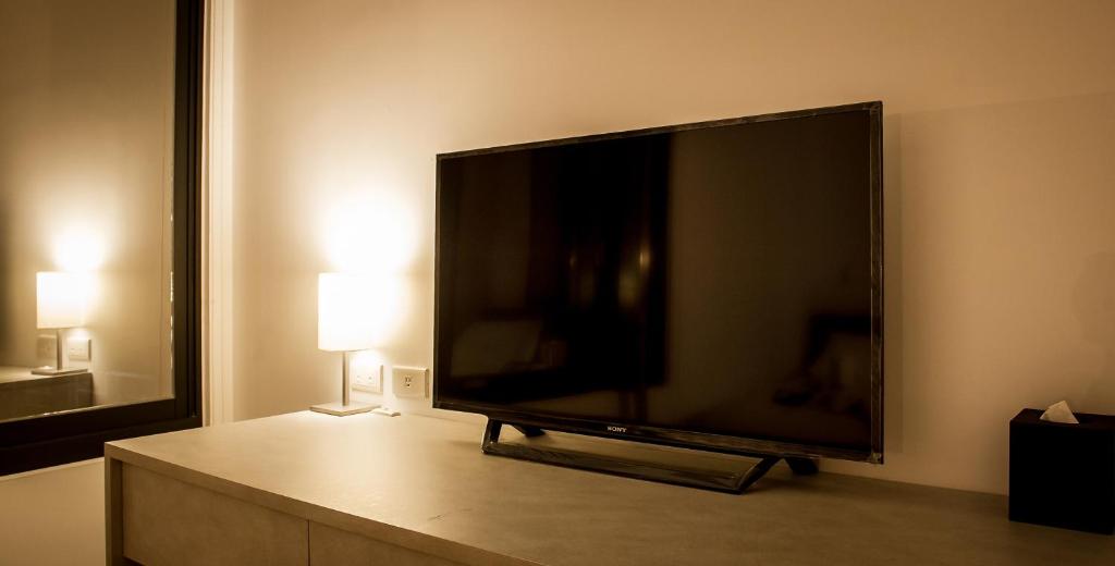 TV a/nebo společenská místnost v ubytování Greatt Hotel